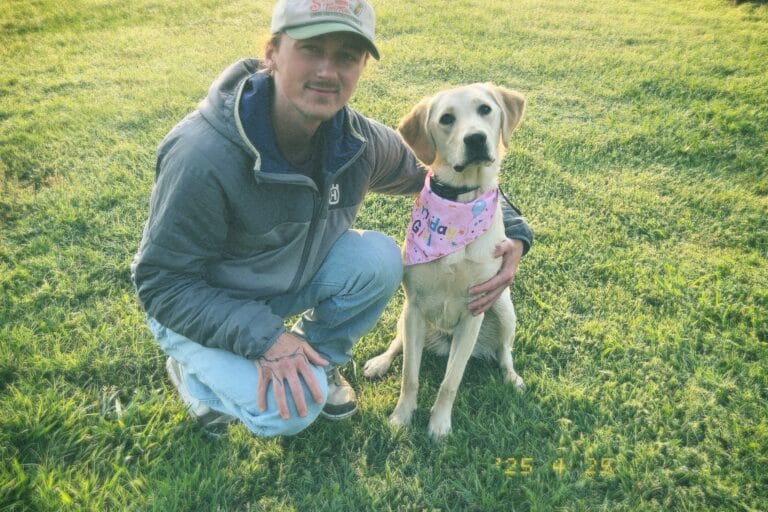 Caleb McReynolds and his dog Xena a Yellow Labrador Retriever who is really beautiful